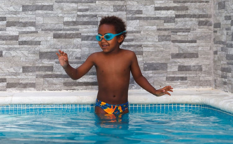 child in a swiming pool