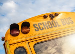 American School Bus Regularly Used to Transport Students to and From School. Transportation Industry.