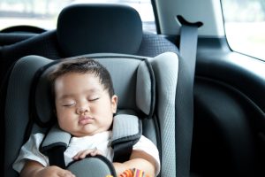 baby boy in car seat.