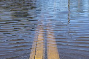 flood water, flood water accident, water on road, high water on road, car stuck in high water, what to do in high water on road, how to drive through high water, how to deal with water on road, what to do when streets are flooded, what to do when road ahead flooded.